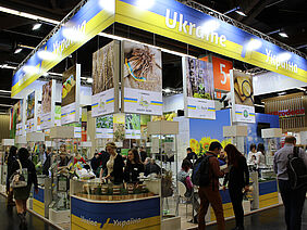 Ukrainian Pavilion at BioFach with attendees and stand personnel.
