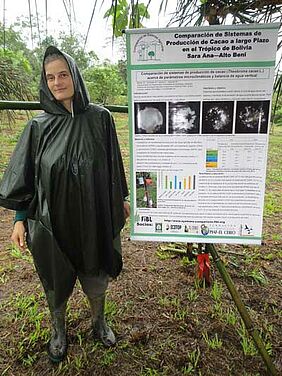 Woman in front of a poster