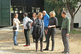 Visitors at a best-practice organic farm