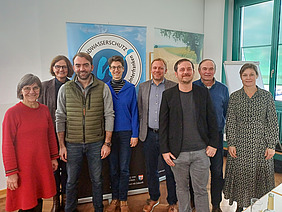 Gruppe von Männern und Frauen