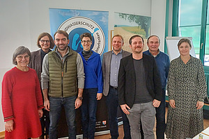 Gruppe von Männern und Frauen