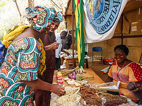 People at a stand