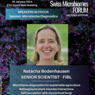 A flyer for ETH swiss microbiome forum. Natacha Bodenhausen from FiBL will talk about microbiome diagnostics. There's a picture of here smiling beautifully. She has blond hair at shoulder length.