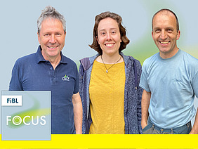 Zwei Männer und eine Frau.