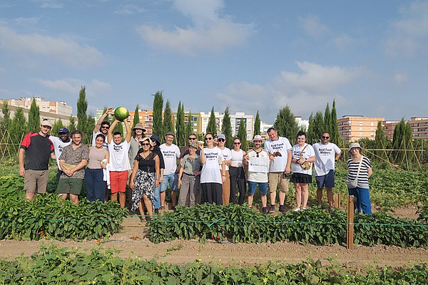 A group of people in a field.
