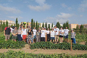 A group of people in a field.