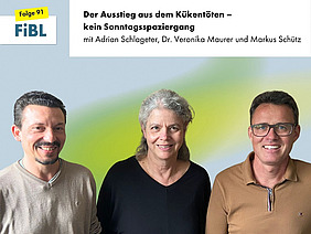 Zwei Männer und eine Frau.