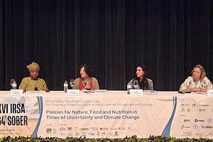 Four women at a panel.