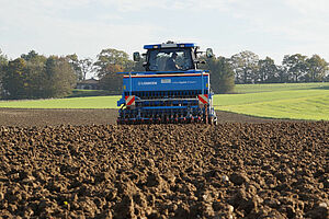 Field cultivation with tractor