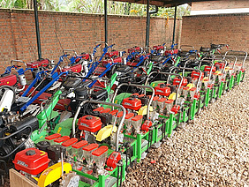 A row of agricultural equipment.