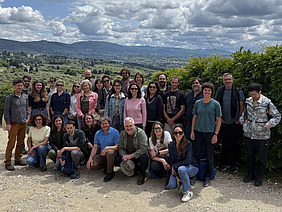 A group of people are posing for the camera.