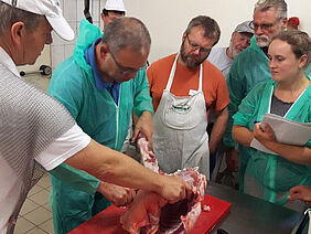 Menschen mit Fleisch.