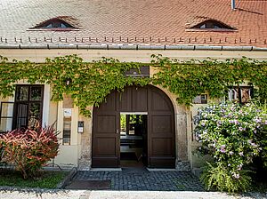 Historical building with a focus on its entrance door.